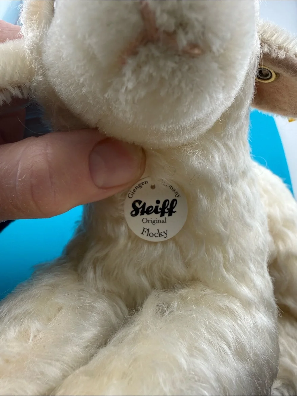 Cream Plush Lamb with Brown Hoof Accents and Yellow Ear Ribbon